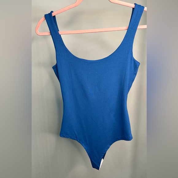 Tops - ⸻

NWT Bright Blue Bodysuit – Sizes S, M, L in